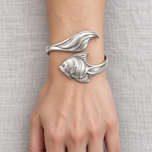 042-silver-plated-angelfish-bangle 3 Silver-tone angelfish bangle design with sculpted stripes and sweeping fins