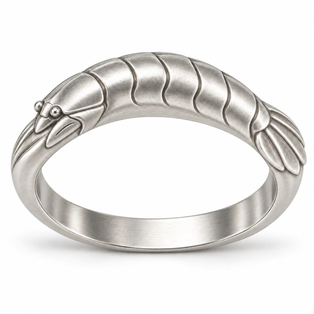 Silver-tone mantis shrimp-inspired bangle design with segmented armor and a broad tail fan