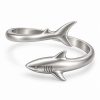 Silver-tone shark bangle design with sculpted fins and engraved gill details