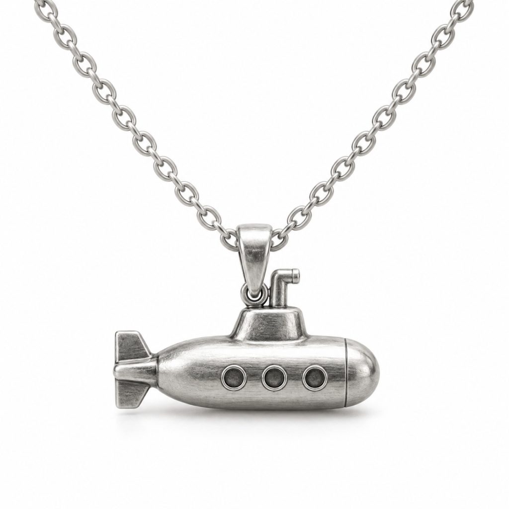 Silver-tone submarine pendant necklace with three circular portholes, a short periscope and an oval-link chain on white