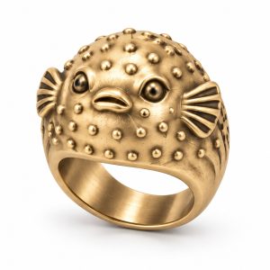 Gold-plated pufferfish ring with rounded raised dots, sculpted side fins and matching metal eyes.