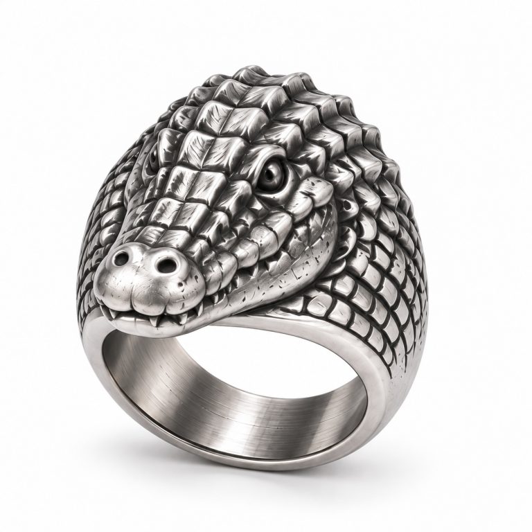 Silver-plated crocodile head ring with raised scales, a sculpted snout and a broad metal band.