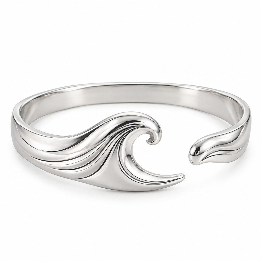 Silver-tone wave bangle with a sculpted ocean wave design