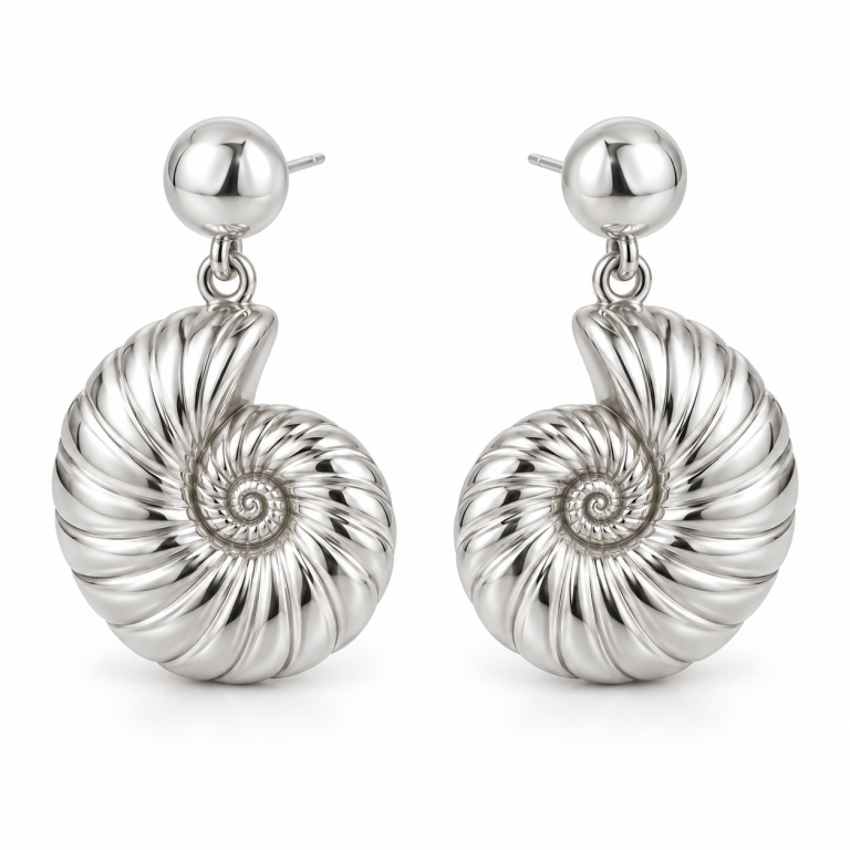 Silver-plated nautilus shell drop earrings with spiral details on white