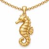 Gold-tone seahorse pendant with a segmented body, recessed eye and short curled tail