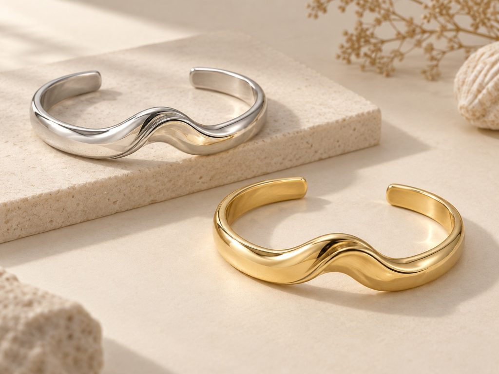 Wave cuff bracelet concepts in silver-tone and gold-tone finishes