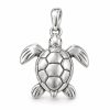 Silver-tone sea turtle pendant with a domed patterned shell and sculpted flippers on a white background.