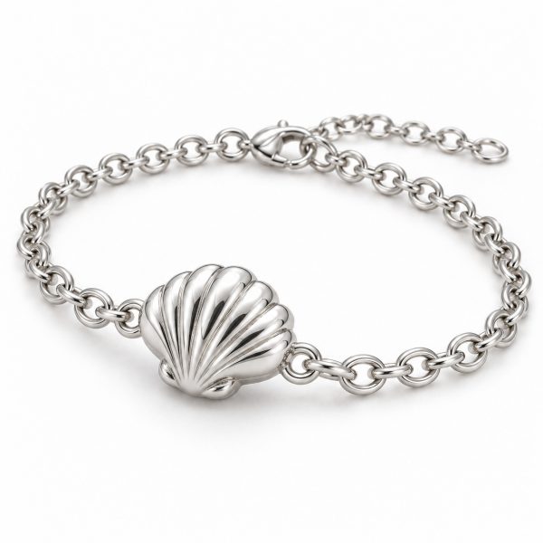 Silver-tone scallop shell chain bracelet with a raised ribbed shell centerpiece, oval links, lobster clasp and extension chain on a white background