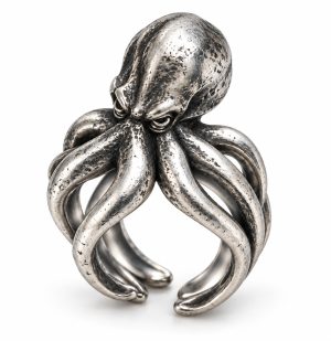 087 silver-tone-sculpted-octopus-statement-ring Silver-tone octopus ring with a sculpted head, recessed eyes and rounded wrapping tentacles on white